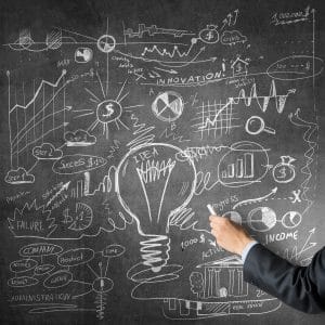 Man draw on chalkboard Innovation